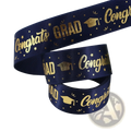 Navy blue satin graduation gift wrapping ribbon with gold foil congrats grad text and graduation cap motifs