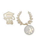 Gold-toned metal graduation cap and laurel wreath cutting dies for scrapbooking and card making projects