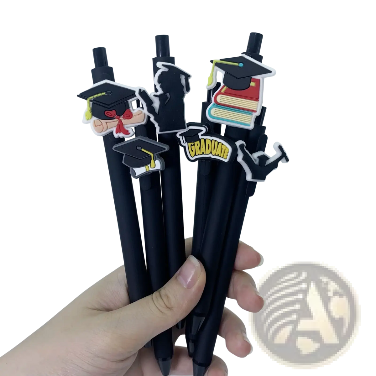 Graduation pens bulk set with black ballpoint pens and colorful silicone caps featuring mortarboards for party favors
