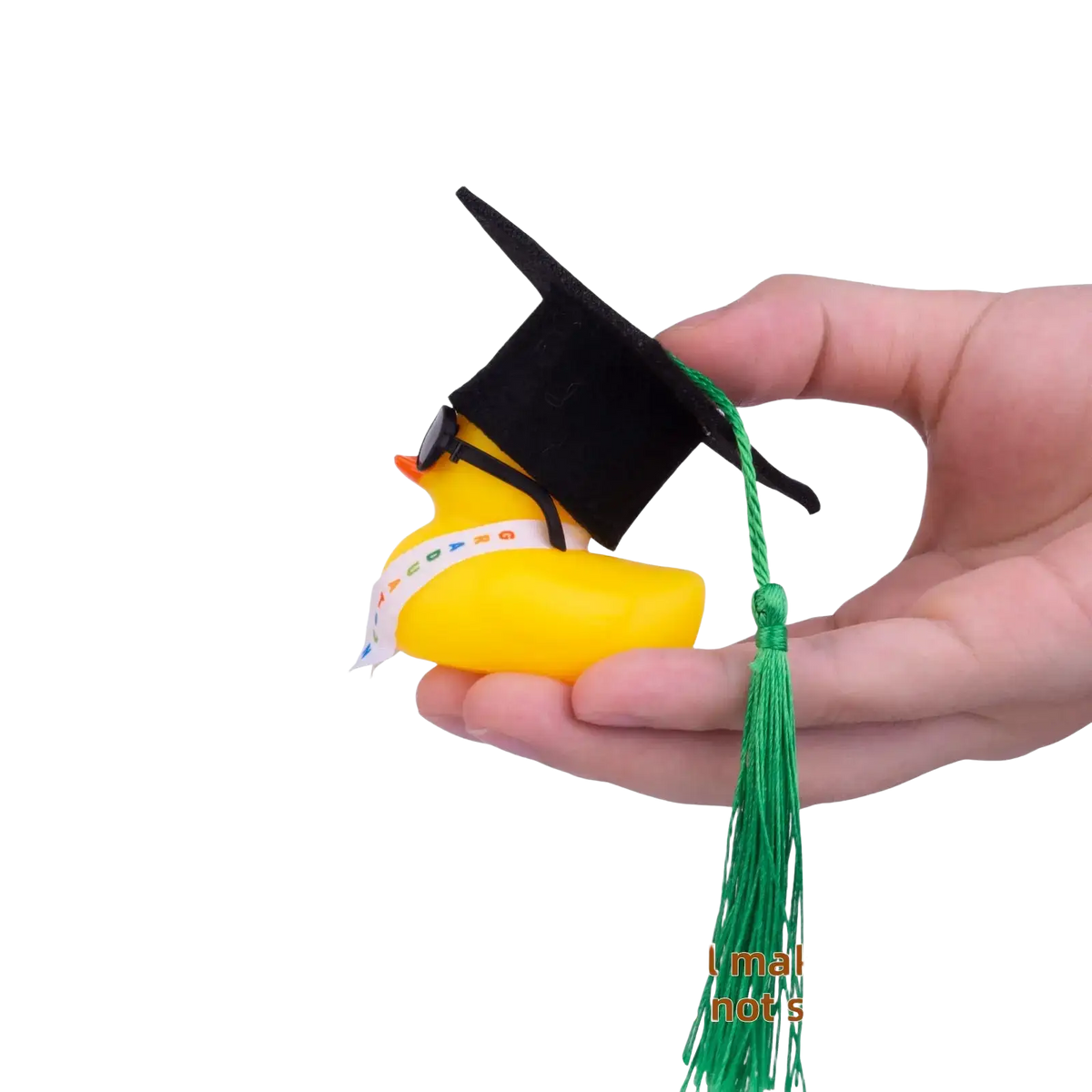 Yellow rubber graduation duck wearing a black cap with green tassel and sunglasses for celebration display