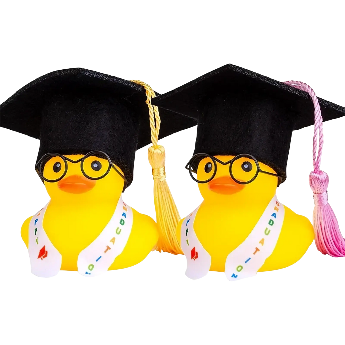 Two yellow rubber graduation ducks with black caps white sashes and glasses for car dashboard ornament