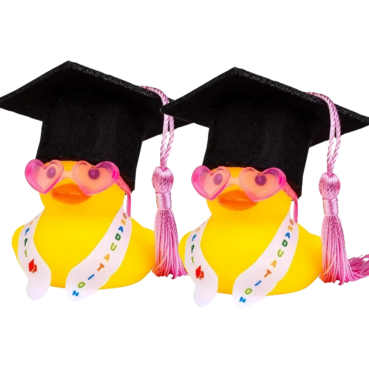 Two yellow rubber ducks with black graduation caps pink tassels heart sunglasses and happy graduation sashes dashboard ornament
