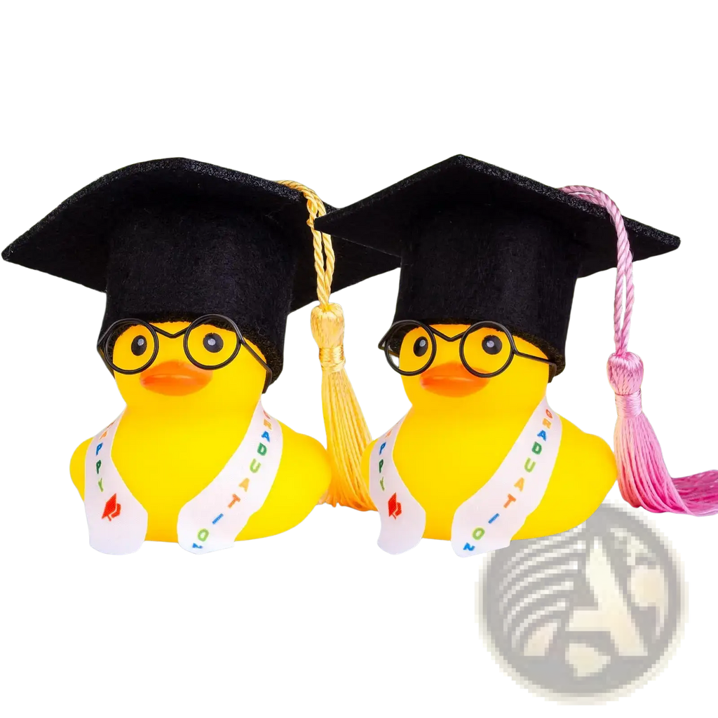 Graduation rubber duck car dashboard ornament featuring two yellow rubber duck graduates with black mortarboard caps and glasses