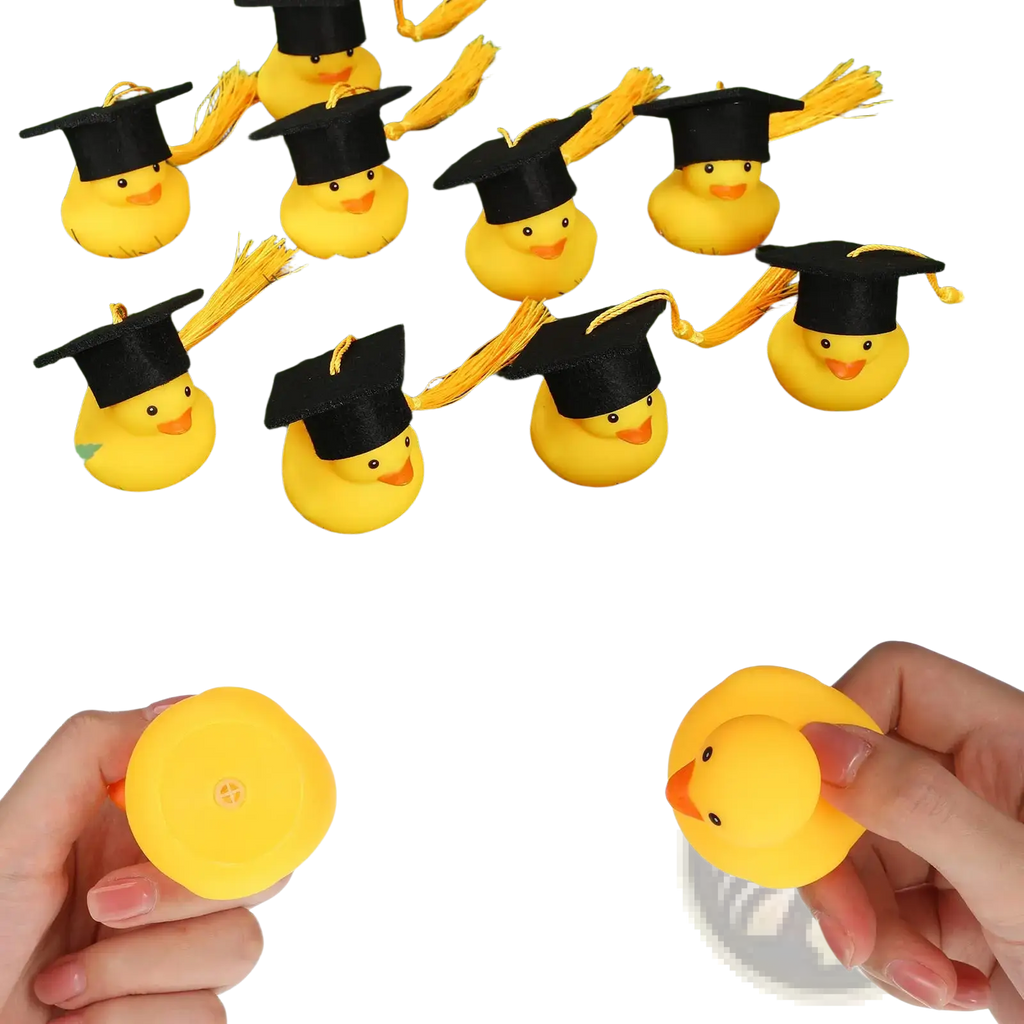 Yellow rubber graduation ducks wearing black caps with yellow tassels for celebratory gifts or decorations
