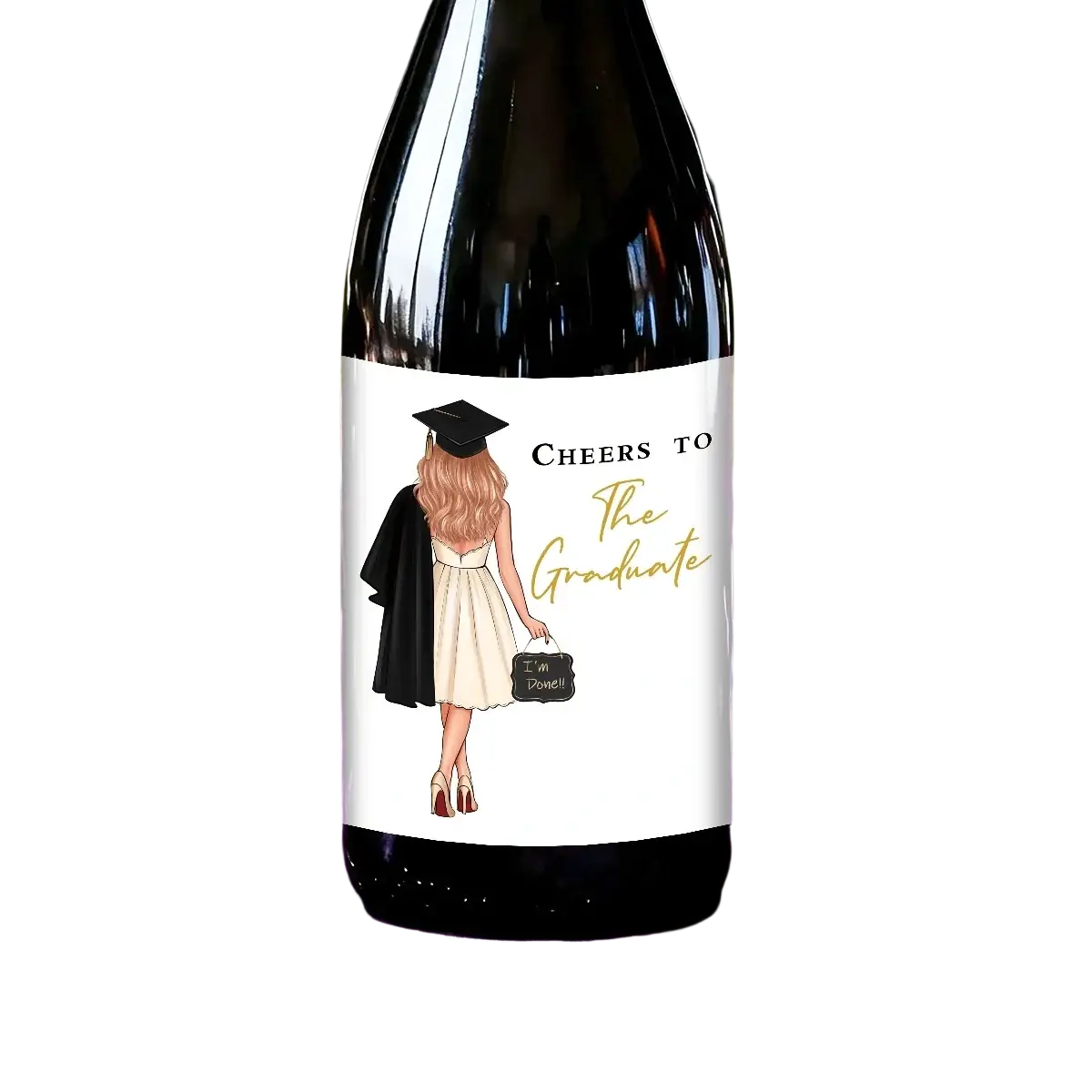 A dark glass wine bottle with a white graduation label showing a graduate holding a small chalkboard reading im done