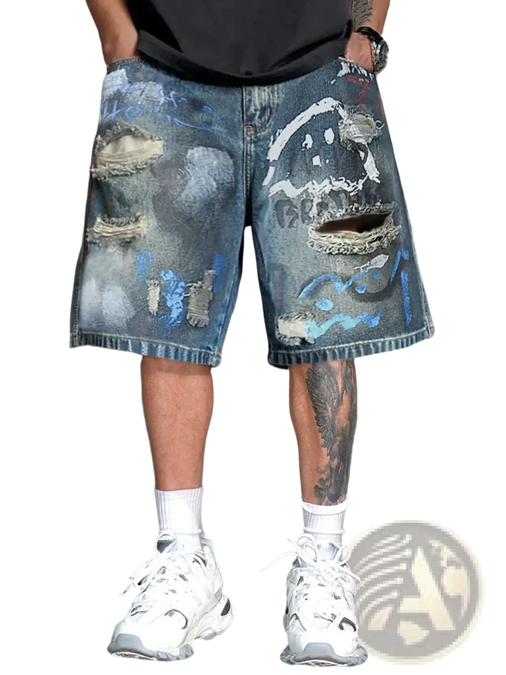 Graffiti distressed denim shorts for men featuring blue ripped knees, faded wash, and abstract paint splatter designs