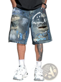 Graffiti distressed denim shorts for men featuring blue ripped knees, faded wash, and abstract paint splatter designs