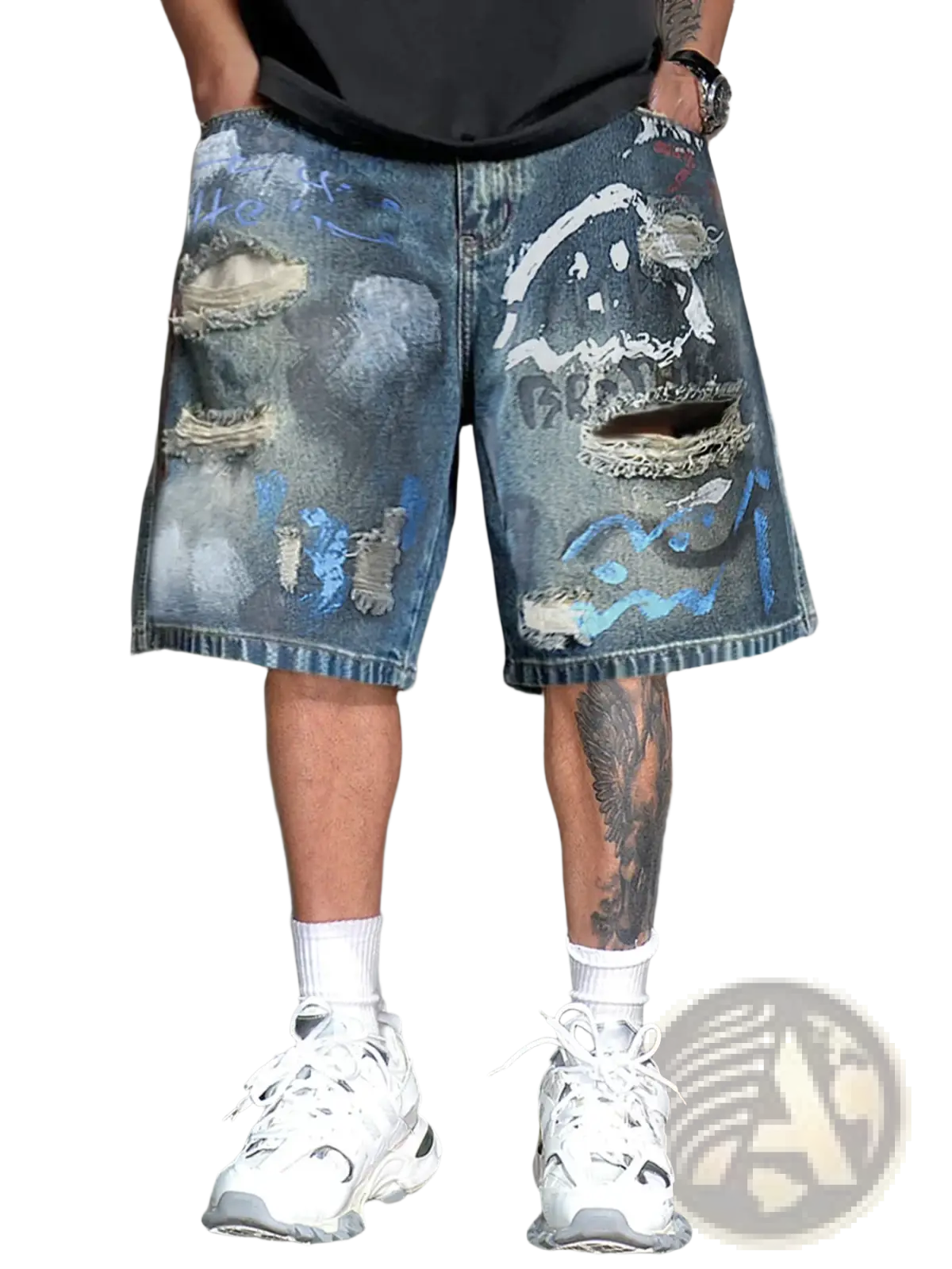 Graffiti distressed denim shorts for men featuring blue ripped knees, faded wash, and abstract paint splatter designs