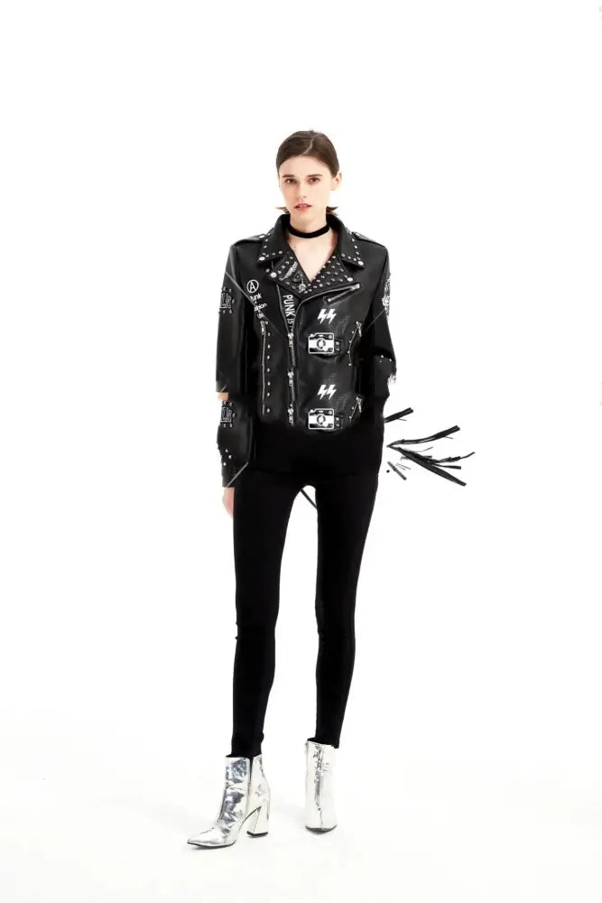Black studded leather biker jacket with silver hardware and graphic patches in womens graffiti rivet fringe style