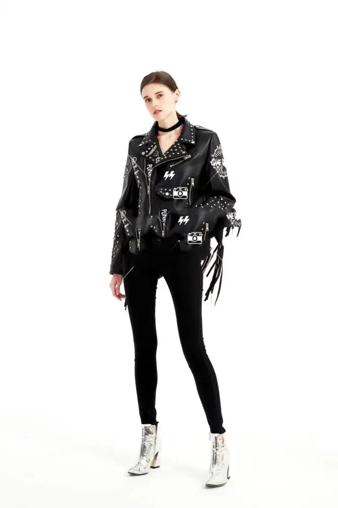 Women’s graffiti rivet studded fringe leather moto jacket in black with graphic patches and textured stud details