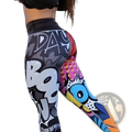 Vibrant graffiti workout leggings featuring high waist pop art design in black white pink blue yellow and orange with day boo print