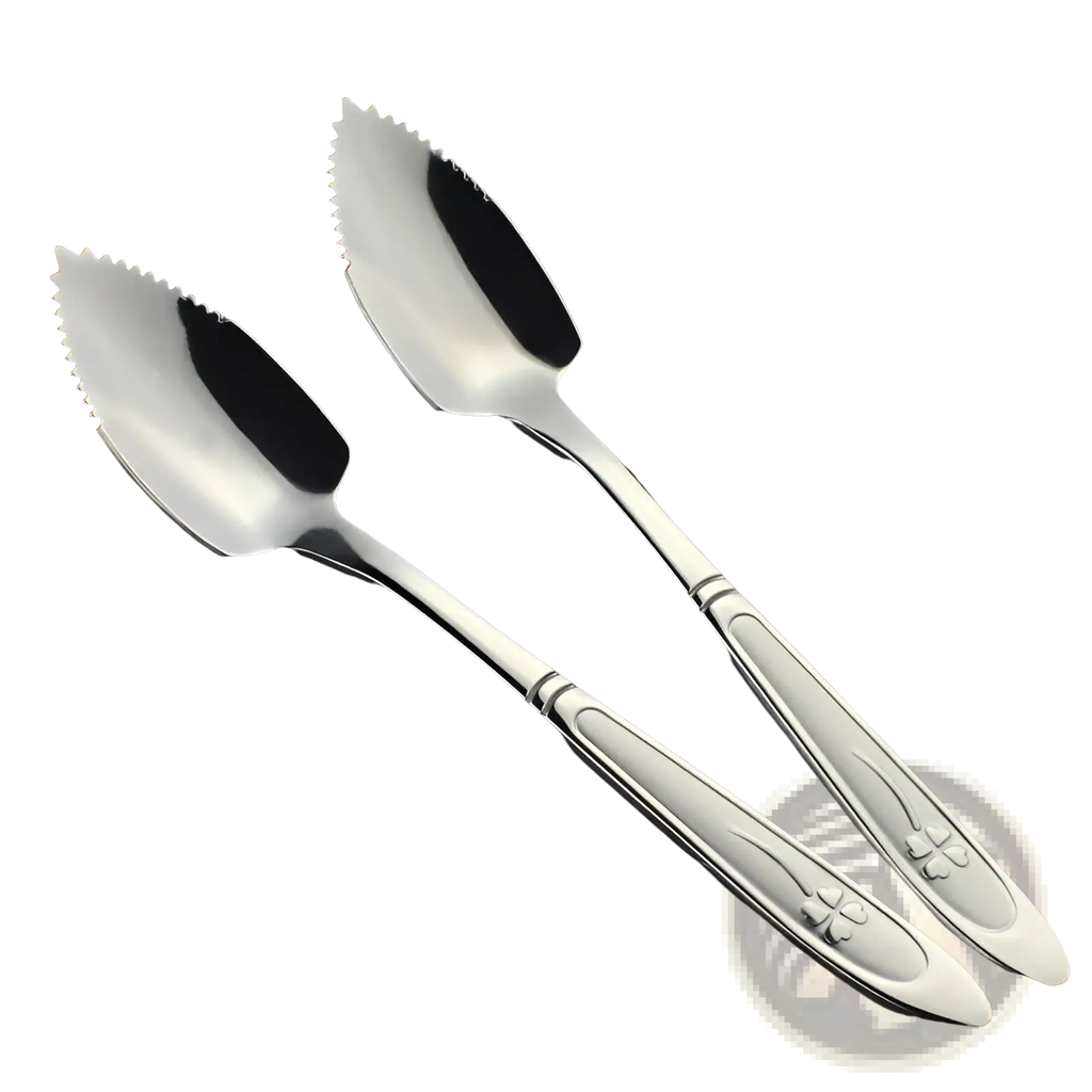 Shiny stainless steel grapefruit spoons with serrated edges and engraved clover designs on handles