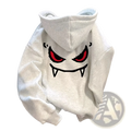 White oversized hoodie with a bold red and black devil face graphic featuring sharp fangs and glowing eyes on the back