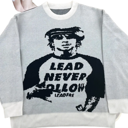 Gray knit sweater featuring a black knitted graphic of a person with sunglasses and lead never follow text in y2k streetwear style