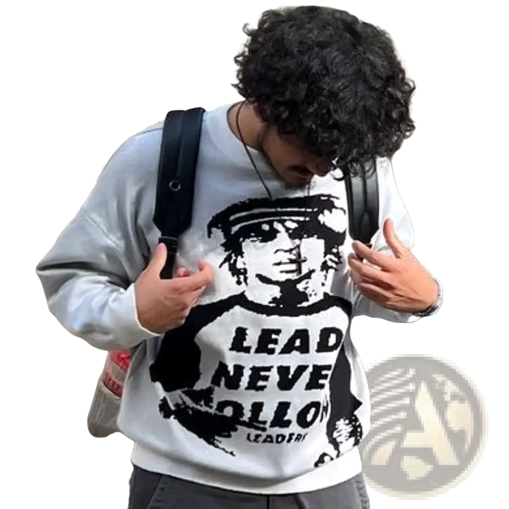 Gray knit sweatshirt with black graphic print featuring stylized portrait and lead never follow text y2k streetwear pullover