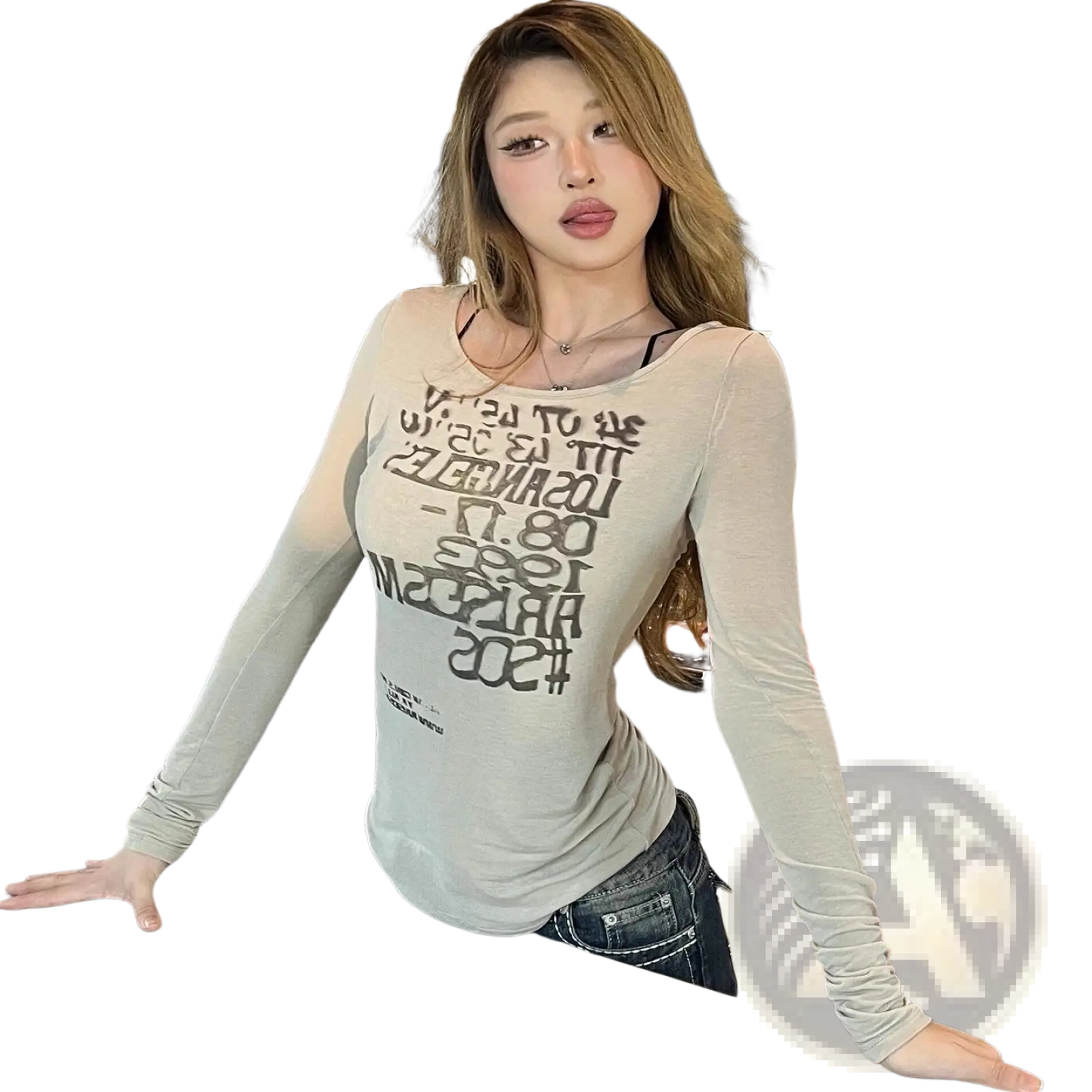 A light gray fitted long sleeve crop top with bold black graphic letter print across the chest