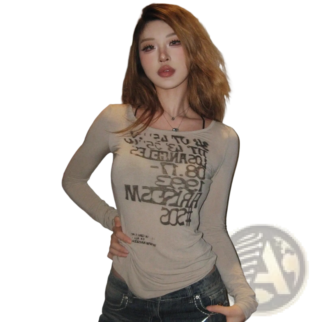Beige long-sleeved crop top with a distressed graphic letter print design made of soft material for casual wear