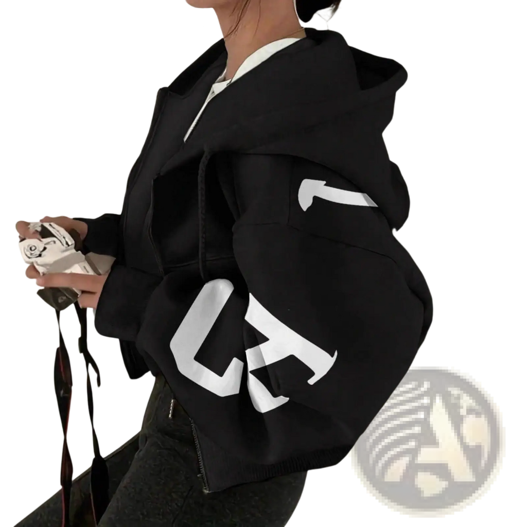 Black zip up sweatshirt with bold white graphic lettering on the sleeves made of comfortable fabric