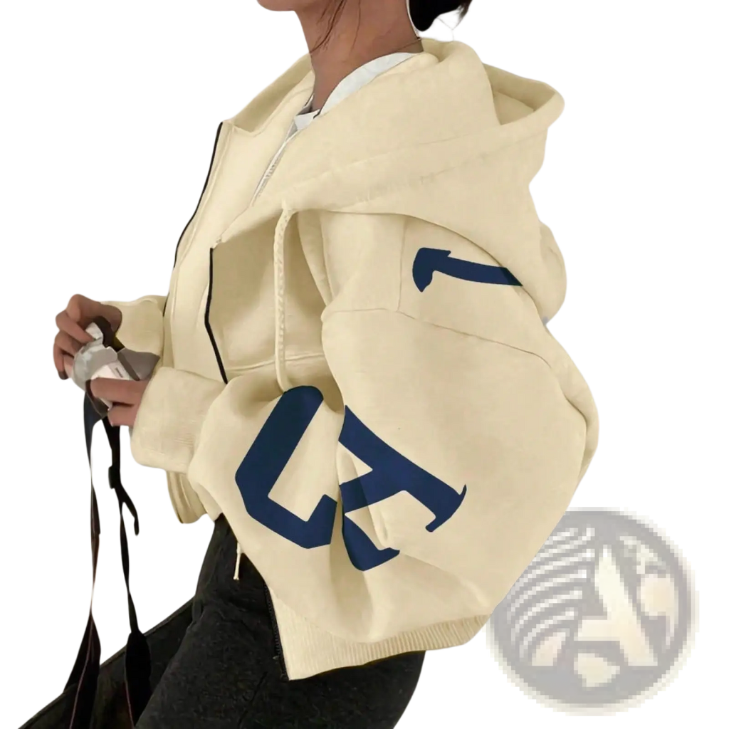 Cream-colored graphic print zip up sweatshirt with bold navy blue lettering on the sleeve made of soft material