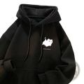 Black graphic pullover hoodie with white ghost chest print and matching drawstrings, ideal for casual sportswear