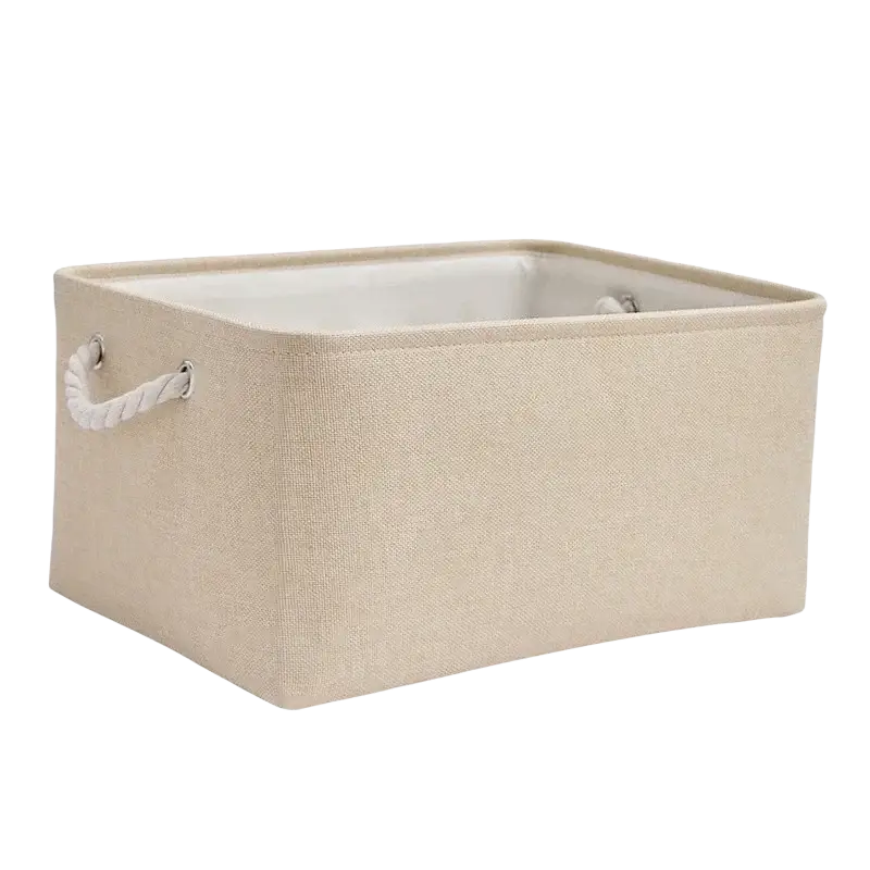 Beige woven fabric storage basket with white rope handles and matching interior lining, ideal as a foldable storage box