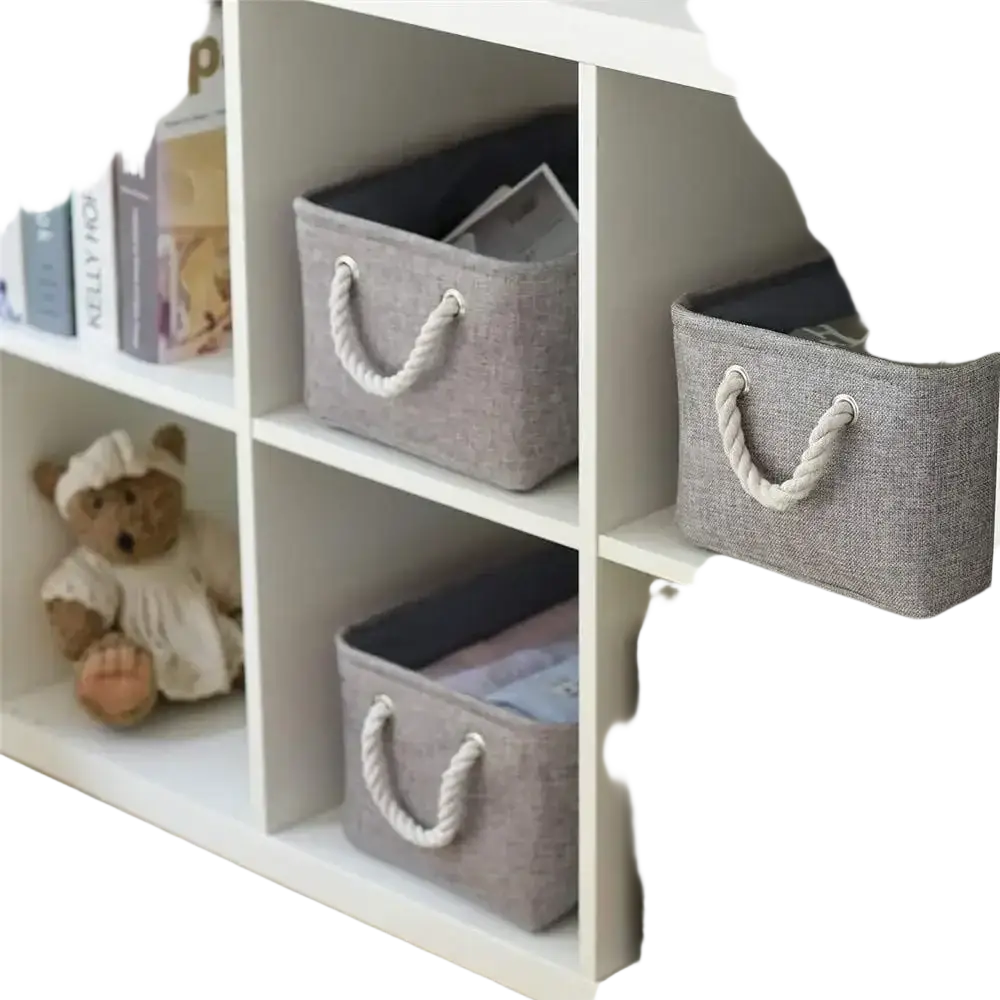 Gray foldable fabric storage basket with white rope handles serving as a versatile storage box and storage basket
