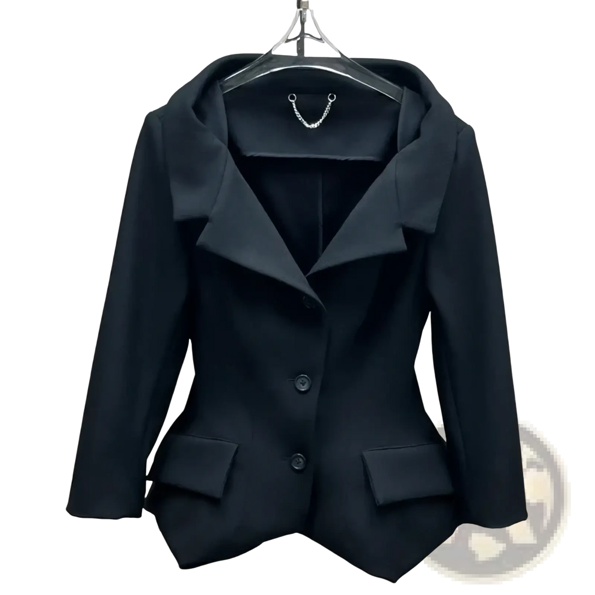 Black blazer with structured tailored fit and notched lapels paired with gray high waisted knee length pencil skirt