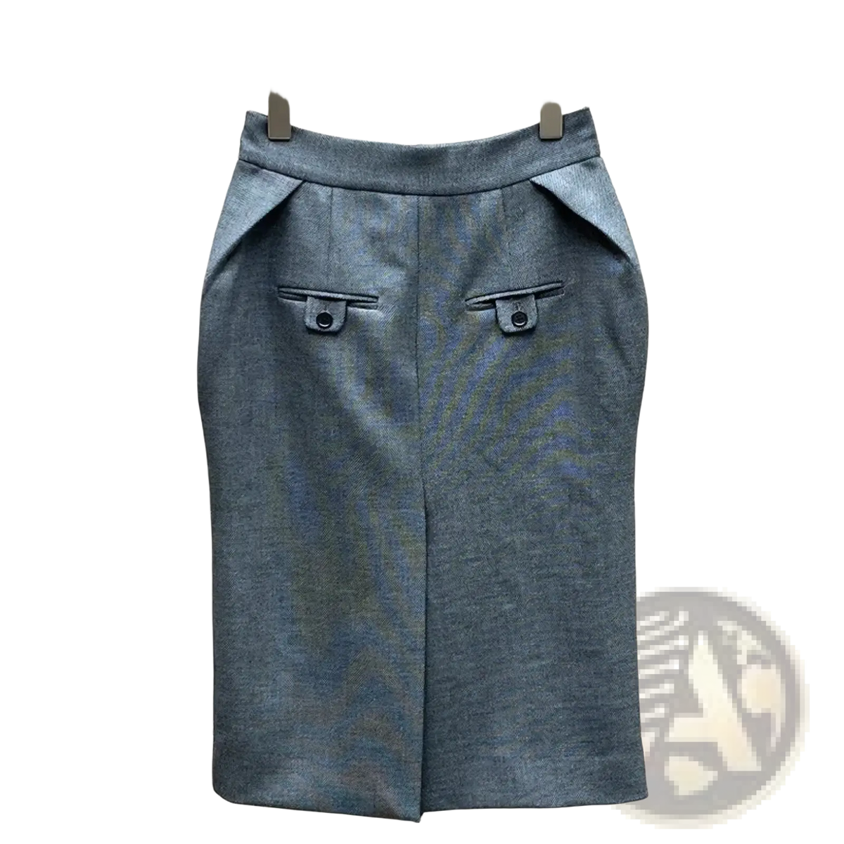 Gray high waisted knee length pencil skirt with textured fabric and front pockets accented by small buttons