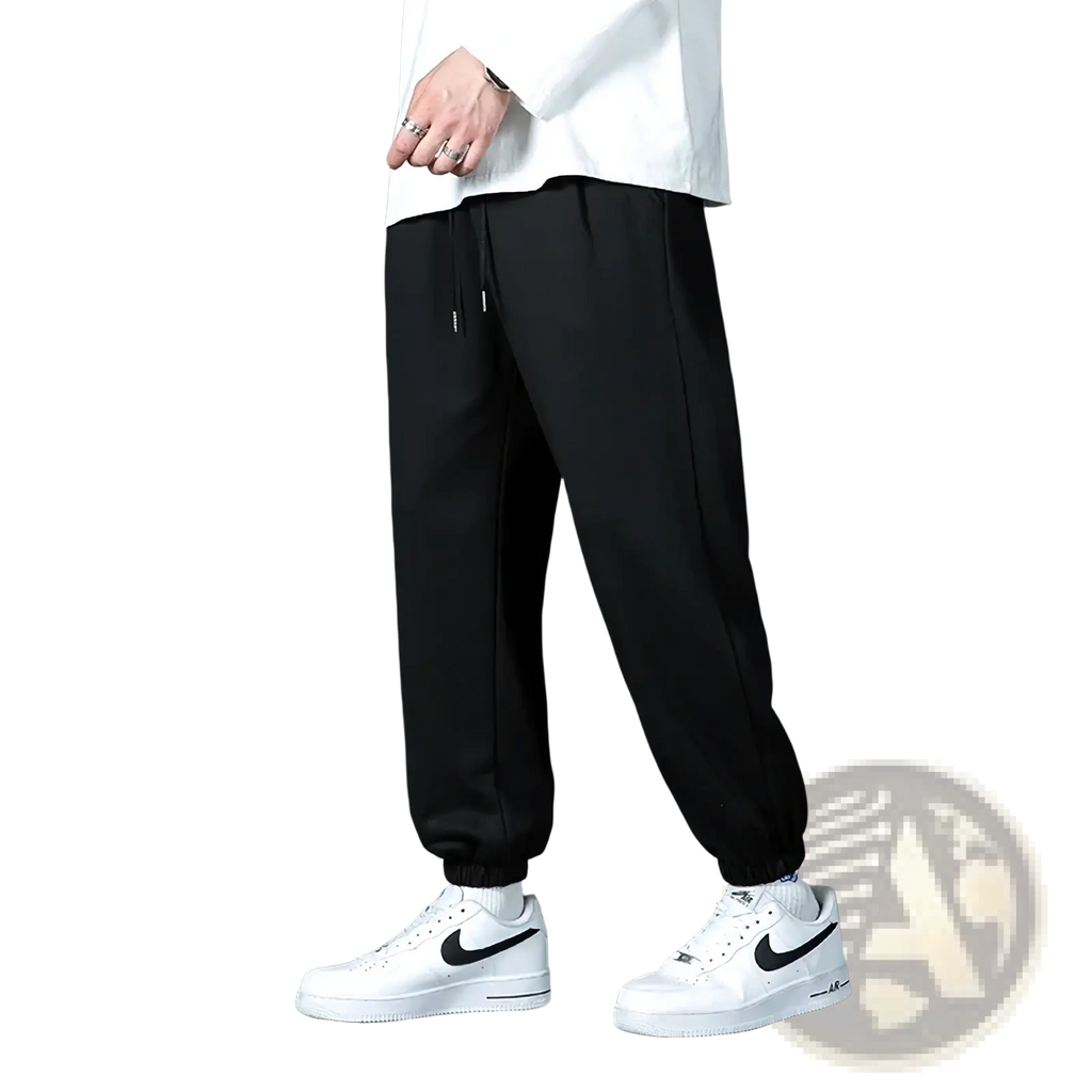 Black drawstring joggers with relaxed fit and elastic cuffs designed for casual wear in gray mens jogger sweatpants style