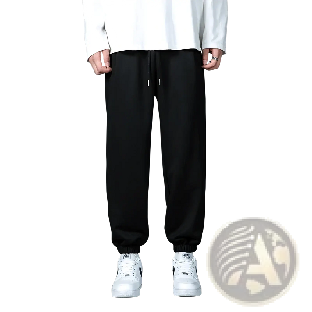 Black drawstring joggers with a relaxed fit and elastic cuffs in casual gray mens jogger sweatpants style