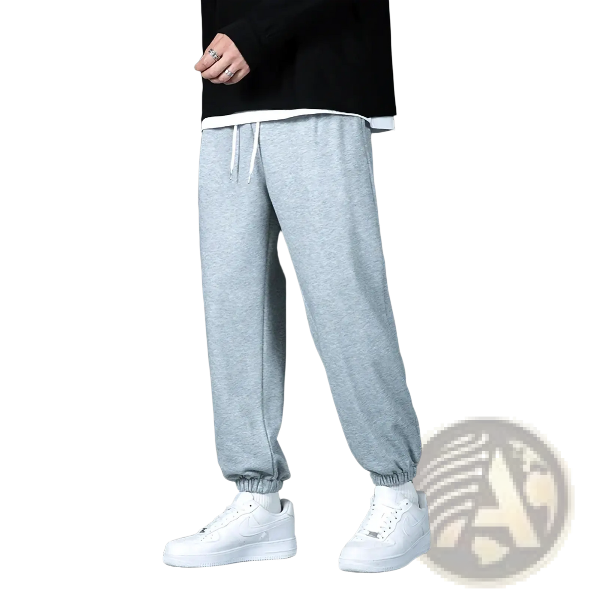 Gray mens jogger sweatpants in heathered fabric with white drawstrings and elastic cuffs for casual wear