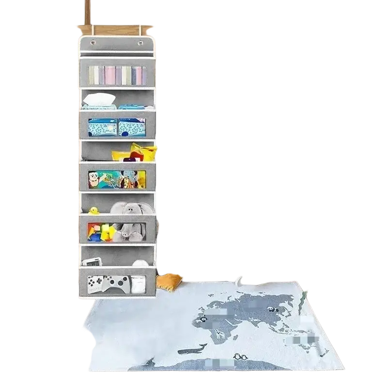 Gray over door hanging storage organizer made of fabric with five pockets holding various items on an over-the-bunk bed