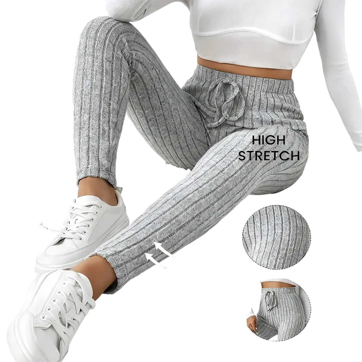 Gray ribbed knit high-stretch jogger pants with a drawstring waistband and ribbed knit texture for comfortable wear
