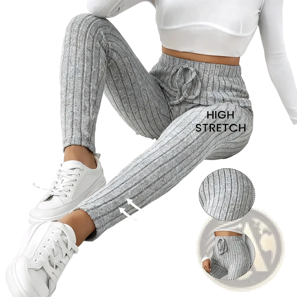 Gray ribbed knit stretchy leggings with high-stretch fabric and a drawstring waistband for comfortable wear
