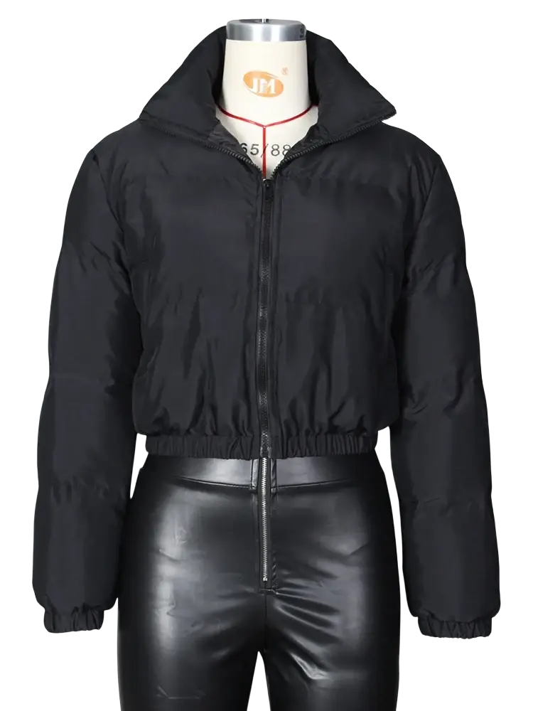 Black puffer jacket with high collar and elastic waistband displayed on mannequin for women’s outerwear