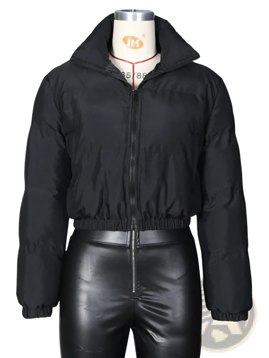 Black puffer jacket with high collar and elastic waistband displayed on mannequin for women’s outerwear