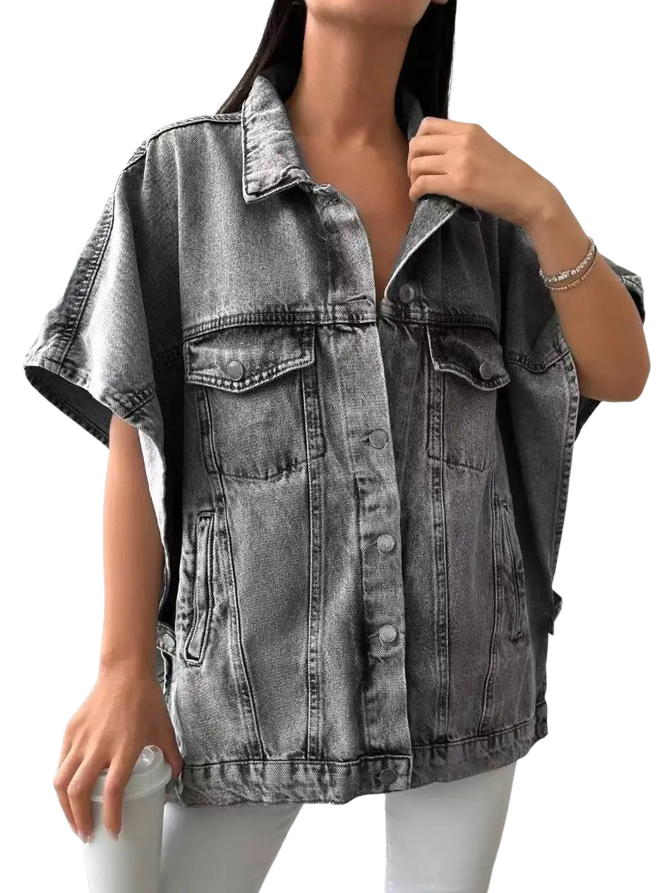 Gray short sleeve denim jacket in faded gray wash with loose fit button closures and flap pockets for casual wear