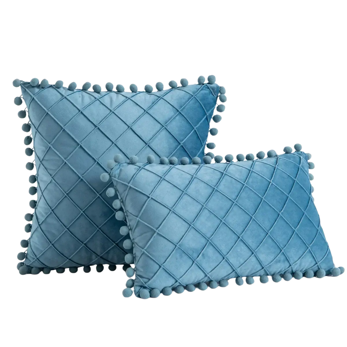 Blue velvet pillow covers with quilted diamond stitching and matching pom-pom trim receiving positive feedback