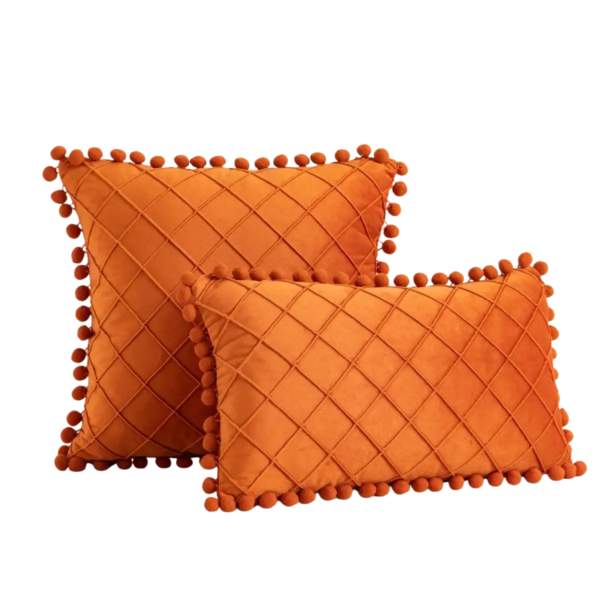 Orange velvet pillow covers with diamond-quilted pattern and pom-pom trim receiving positive feedback