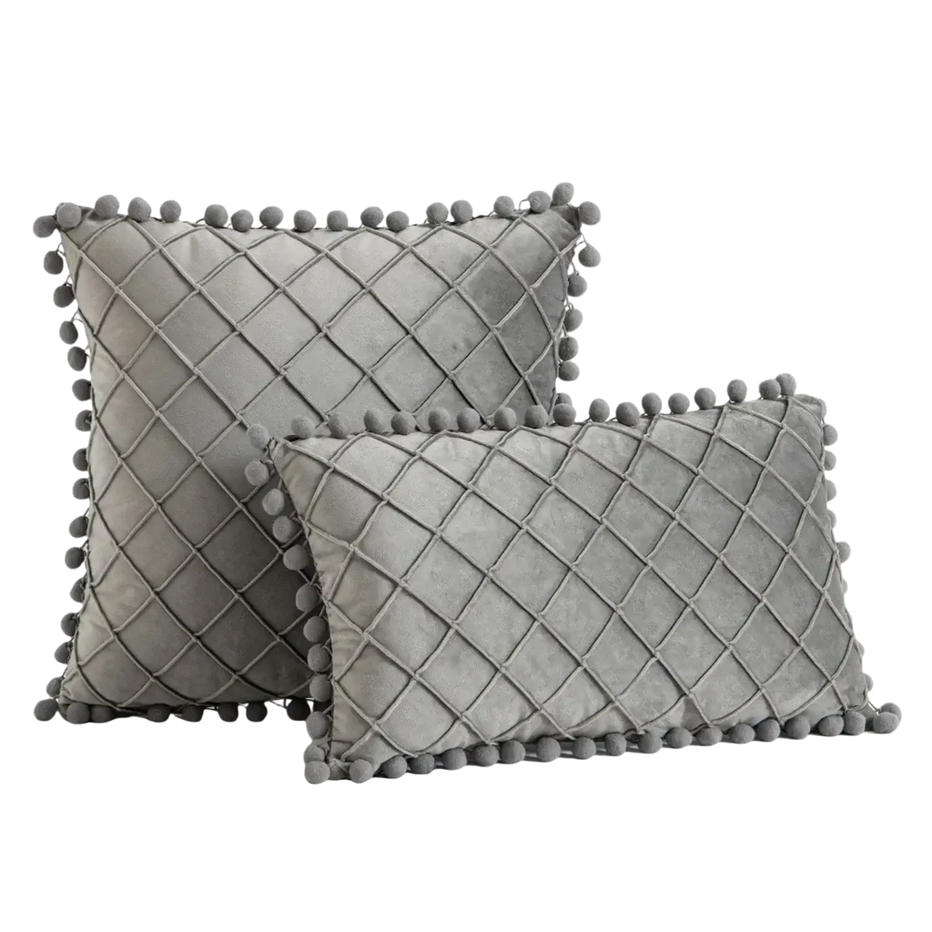 Gray velvet pillow cover with pom-poms and diamond-quilted pattern offering positive feedback for pillow covers
