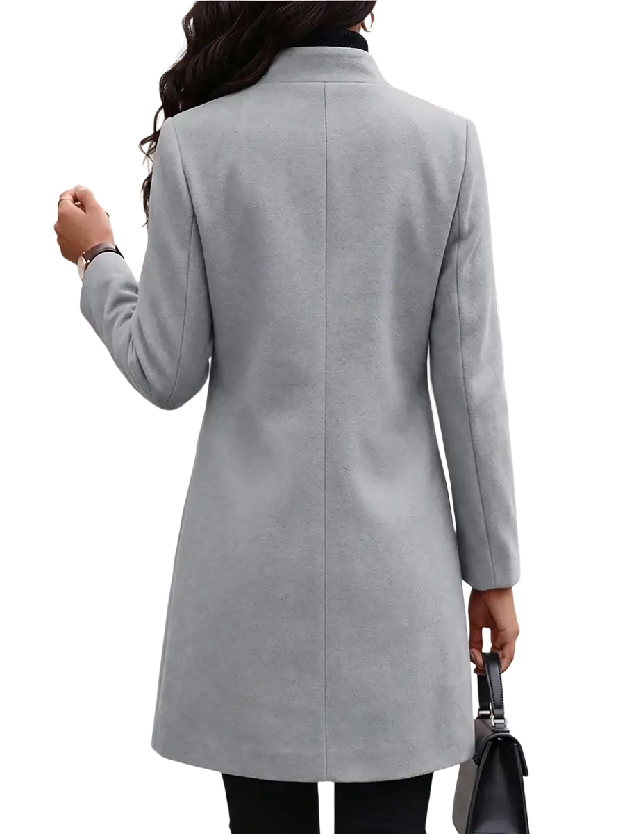 A sleek light gray slim fit long woolen coat with a classic stand collar and straight-cut silhouette