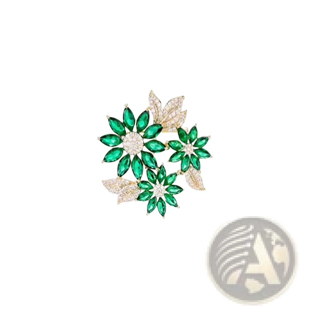 Green floral rhinestone brooch pin with sparkling green and gold petals and a diamond-studded center with leaf accents