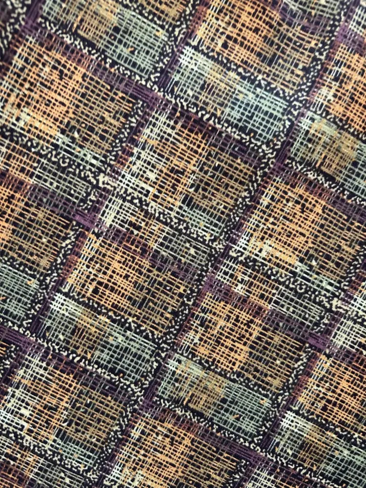 Green plaid doris vintage cotton midi skirt with pockets featuring textured woven fabric in earthy brown beige and muted purple tones