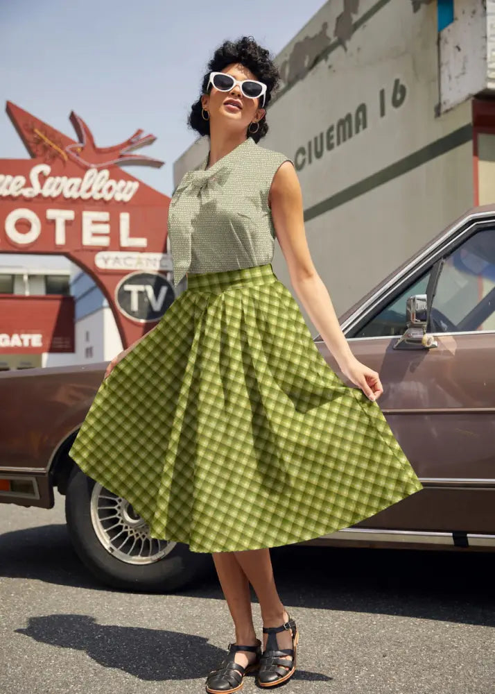 A vibrant lime green green plaid Doris cotton a-line skirt with classic checkered pattern and pockets