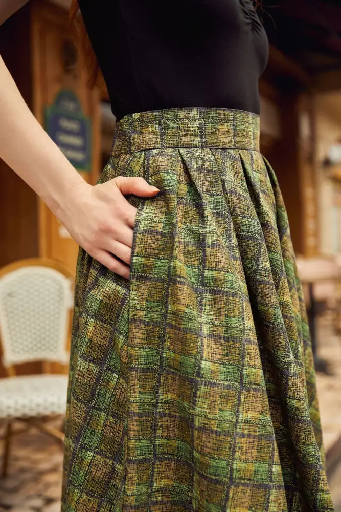 Green plaid doris vintage cotton midi skirt with pockets featuring a textured flared woven fabric design