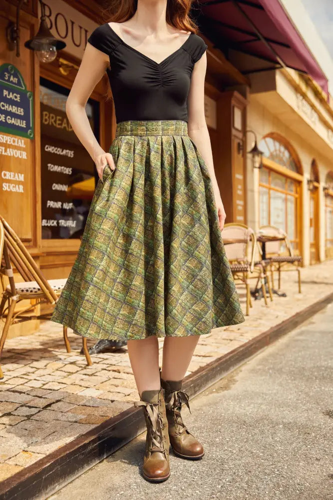 Green plaid Doris vintage cotton midi skirt with pockets featuring a high waistband in beige and green plaid pattern