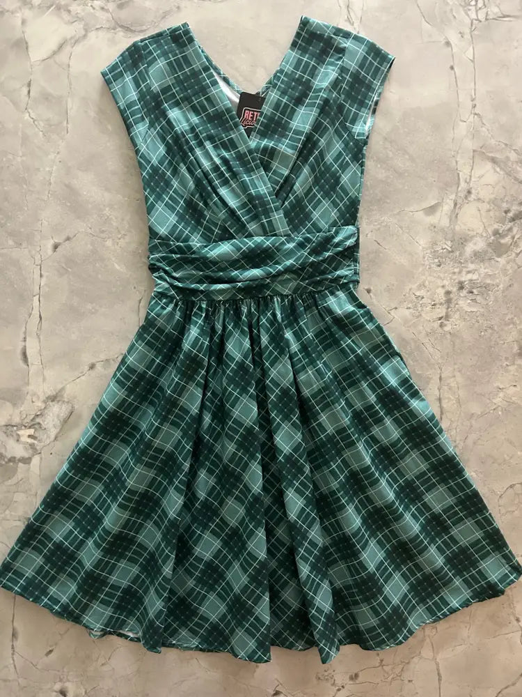 Greta green plaid v-neck cotton dress with gathered waist and pockets in a classic feminine style