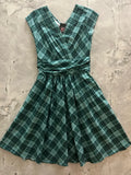 Greta green plaid v-neck cotton dress with gathered waist and pockets in a classic feminine style
