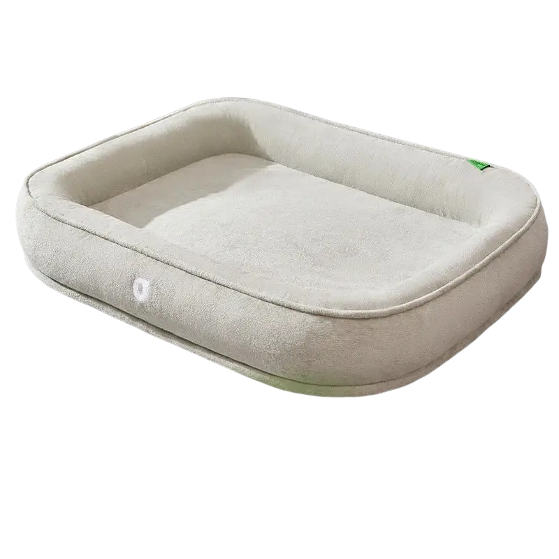 Beige plush rectangular dog bed with soft cushioned interior and rounded edges from green plush washable pet cushion line