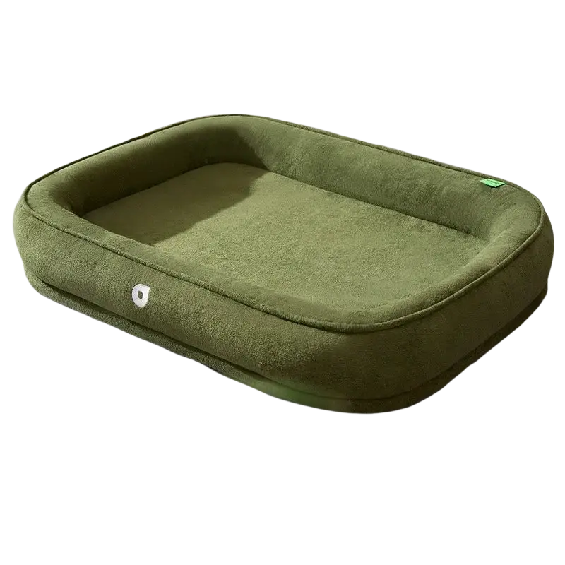 Olive green plush rectangular dog bed with soft cushioned edges and cozy interior washable pet cushion